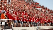 The MUSS student section cheering on the football team.